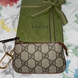 Gucci Supreme key pouch GG